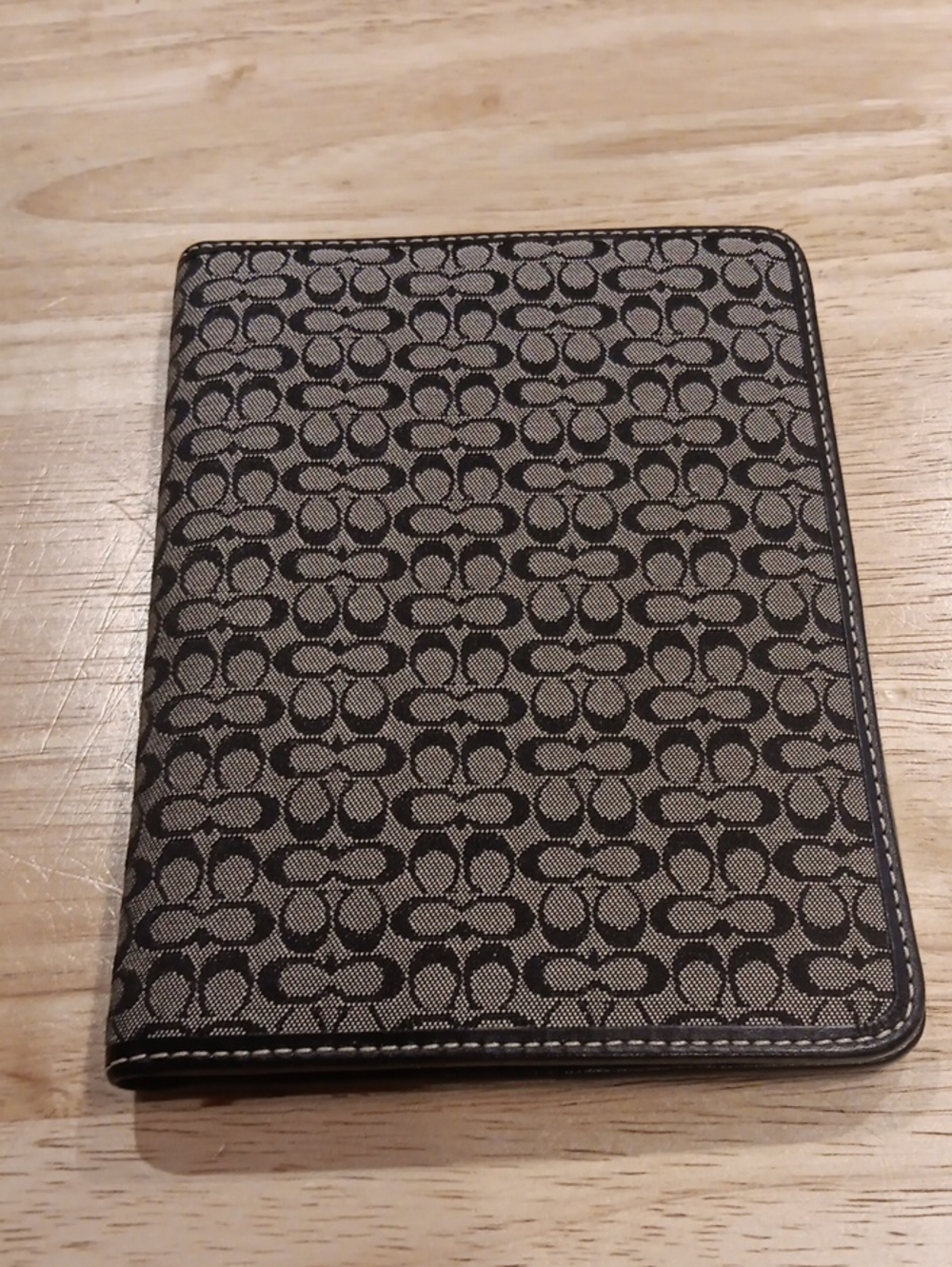 Vintage Coach pocket photo album with the classic mini "C" signature monogram.